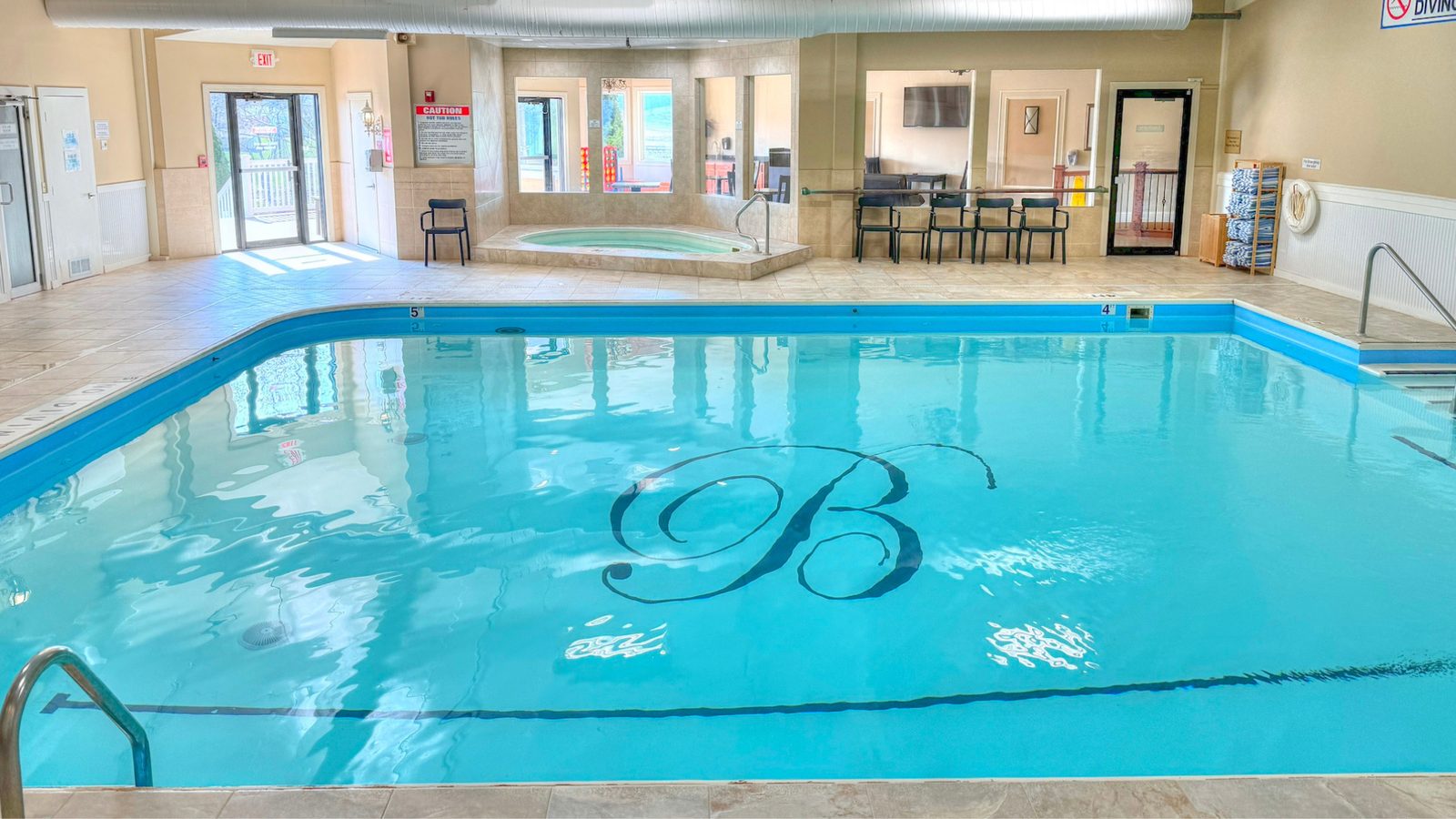 The indoor pool at The Club, with the hot tub in the background
